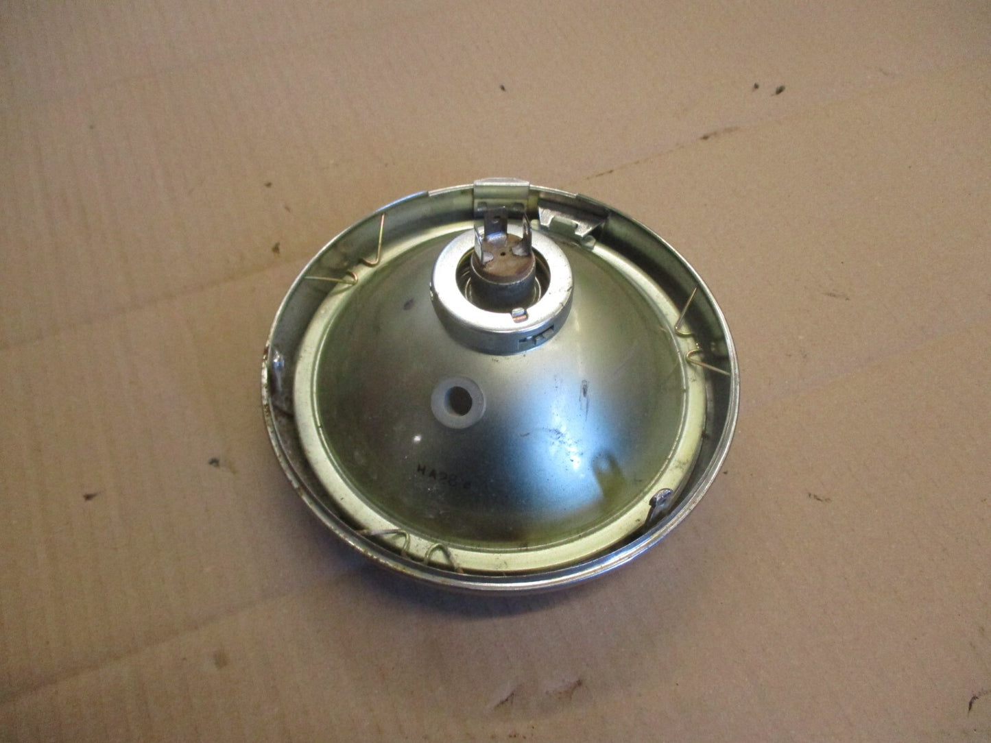 Phare + optique STANLEY 0001-1293 + cerclage pour Honda 125 CM - JC05