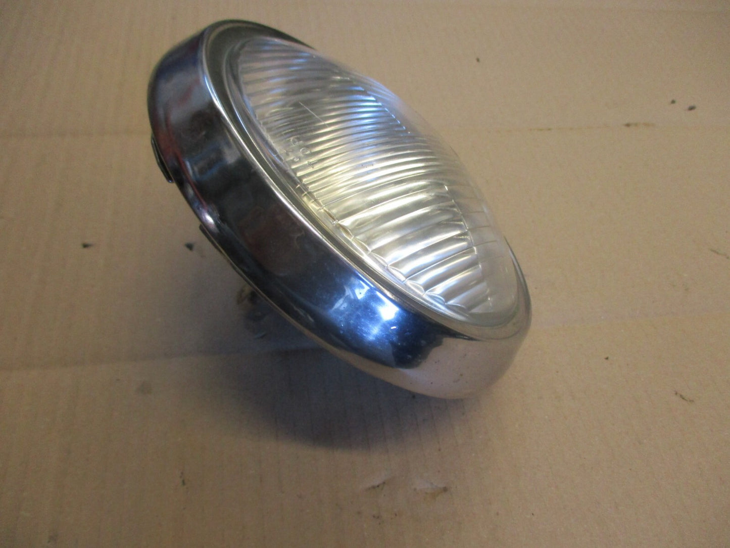 Phare + optique STANLEY 0001-1293 + cerclage pour Honda 125 CM - JC05