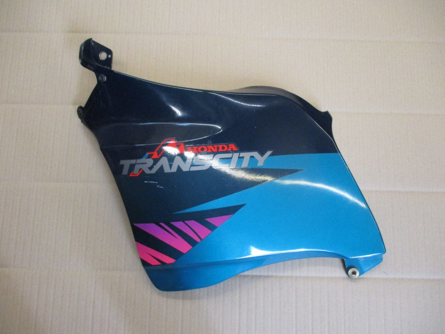 Flanc de carénage gauche pour Honda 125 NX Transcity - JD12
