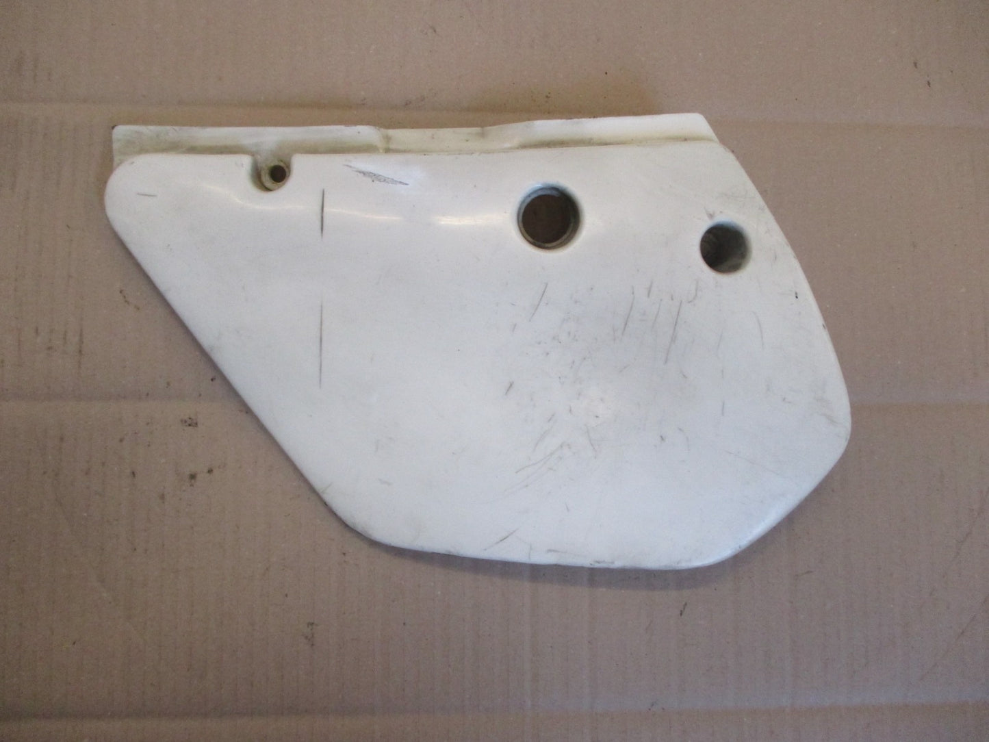 Cache latéral gauche pour Kawasaki 125 KMX - MX125B