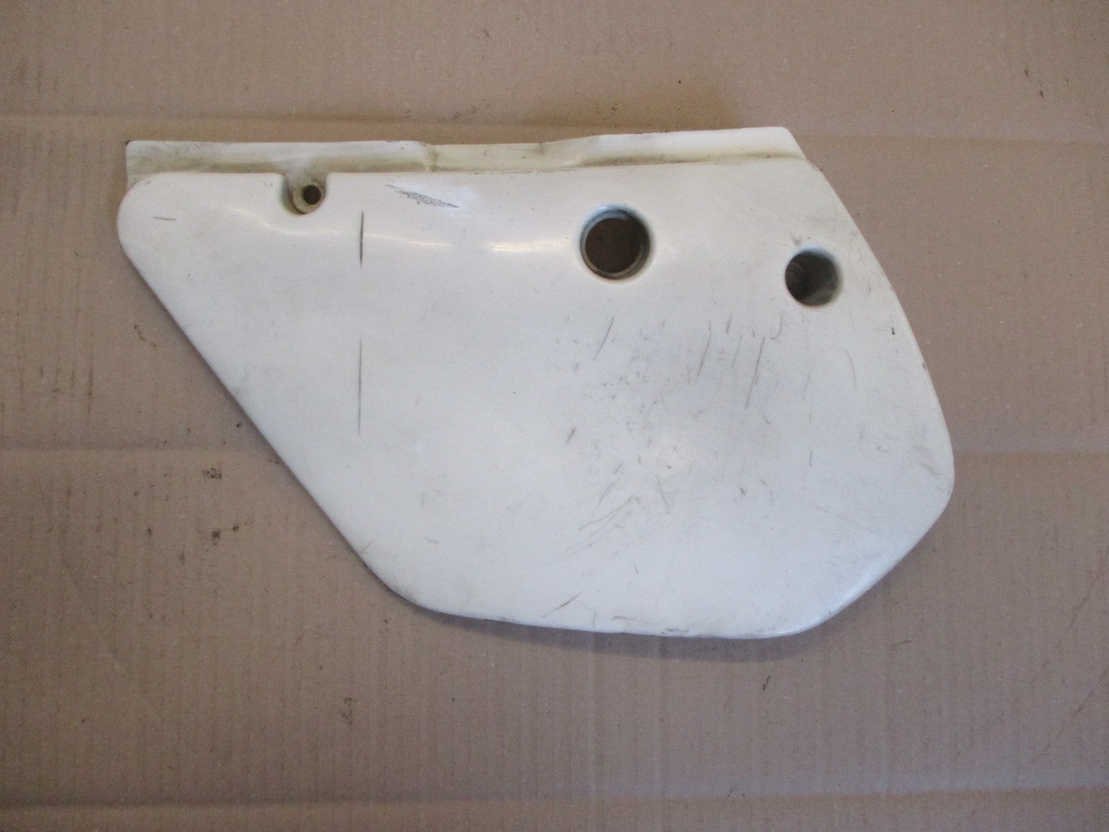 Cache latéral gauche pour Kawasaki 125 KMX - MX125B