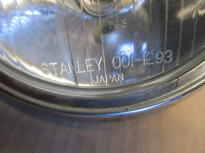 Phare + optique STANLEY 0001-1293 + cerclage pour Honda 125 CM - JC05
