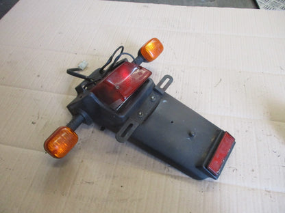 Bavette + feu + clignotants arrières pour  Cagiva 350 - W12 - 2N1