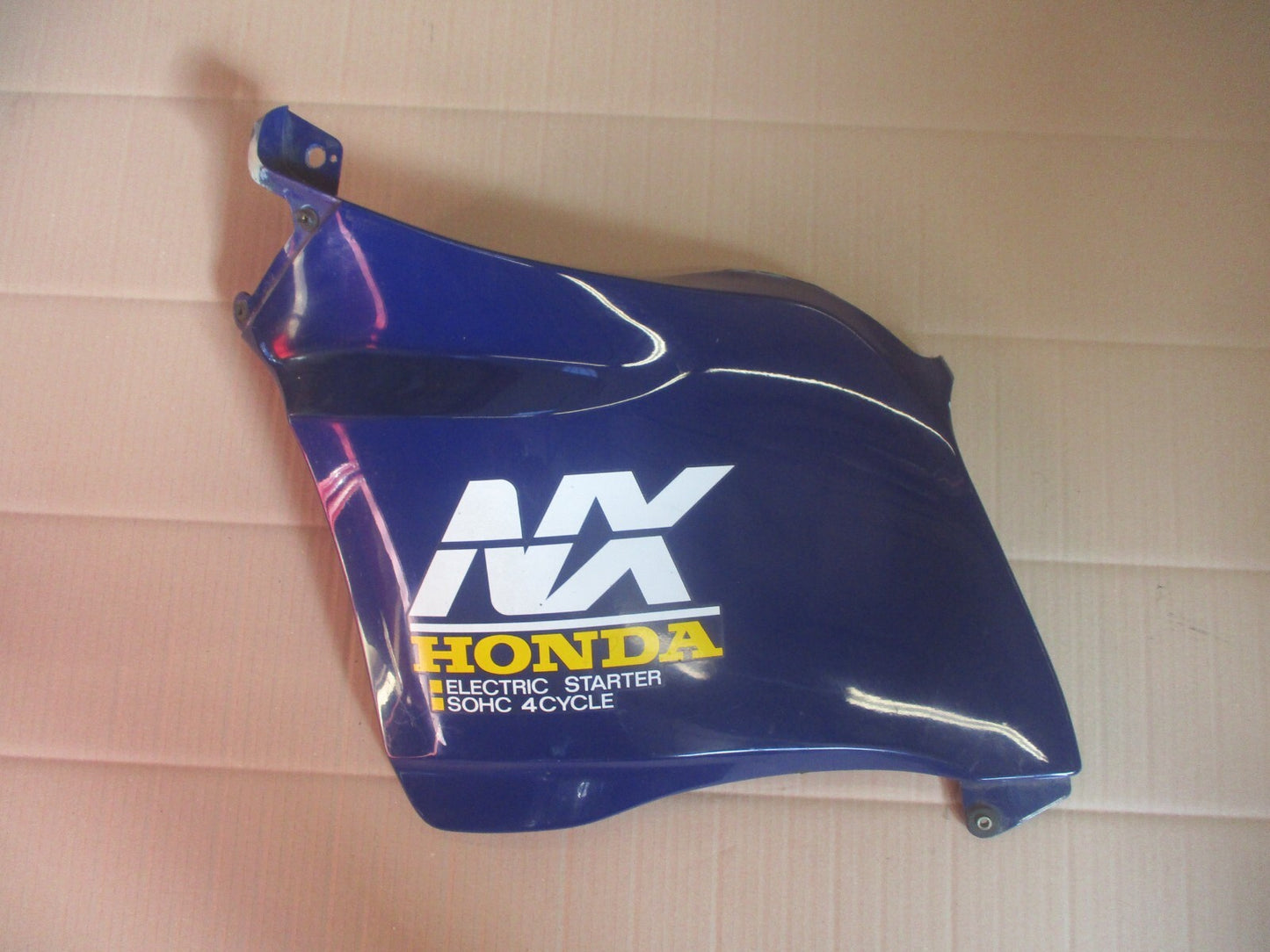 Flanc de carénage gauche pour Honda 125 NX Transcity - JD12