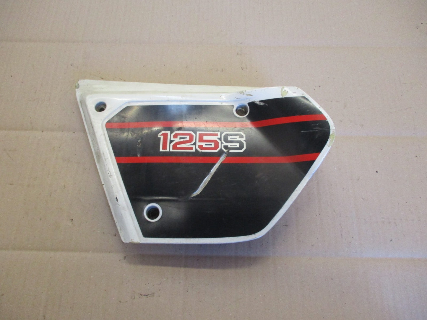 Cache latéral gauche pour Honda 125 XLS
