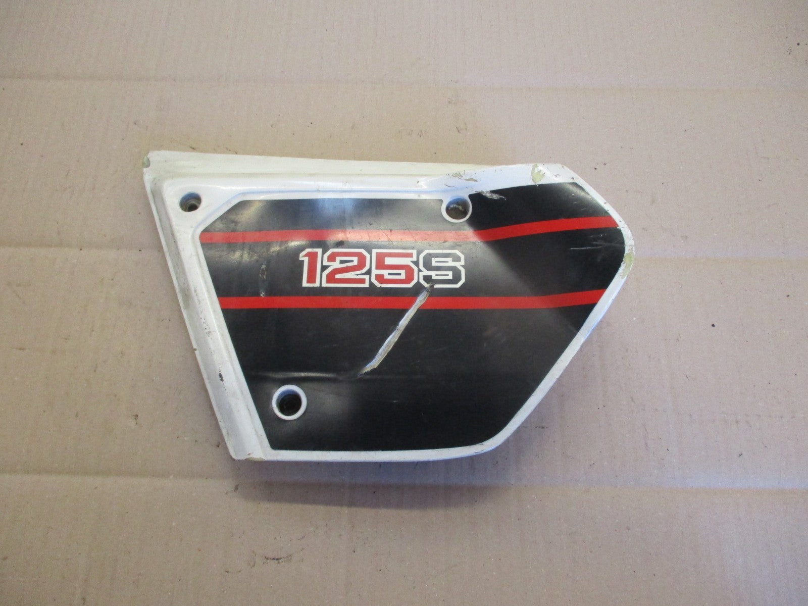 Cache latéral gauche pour Honda 125 XLS