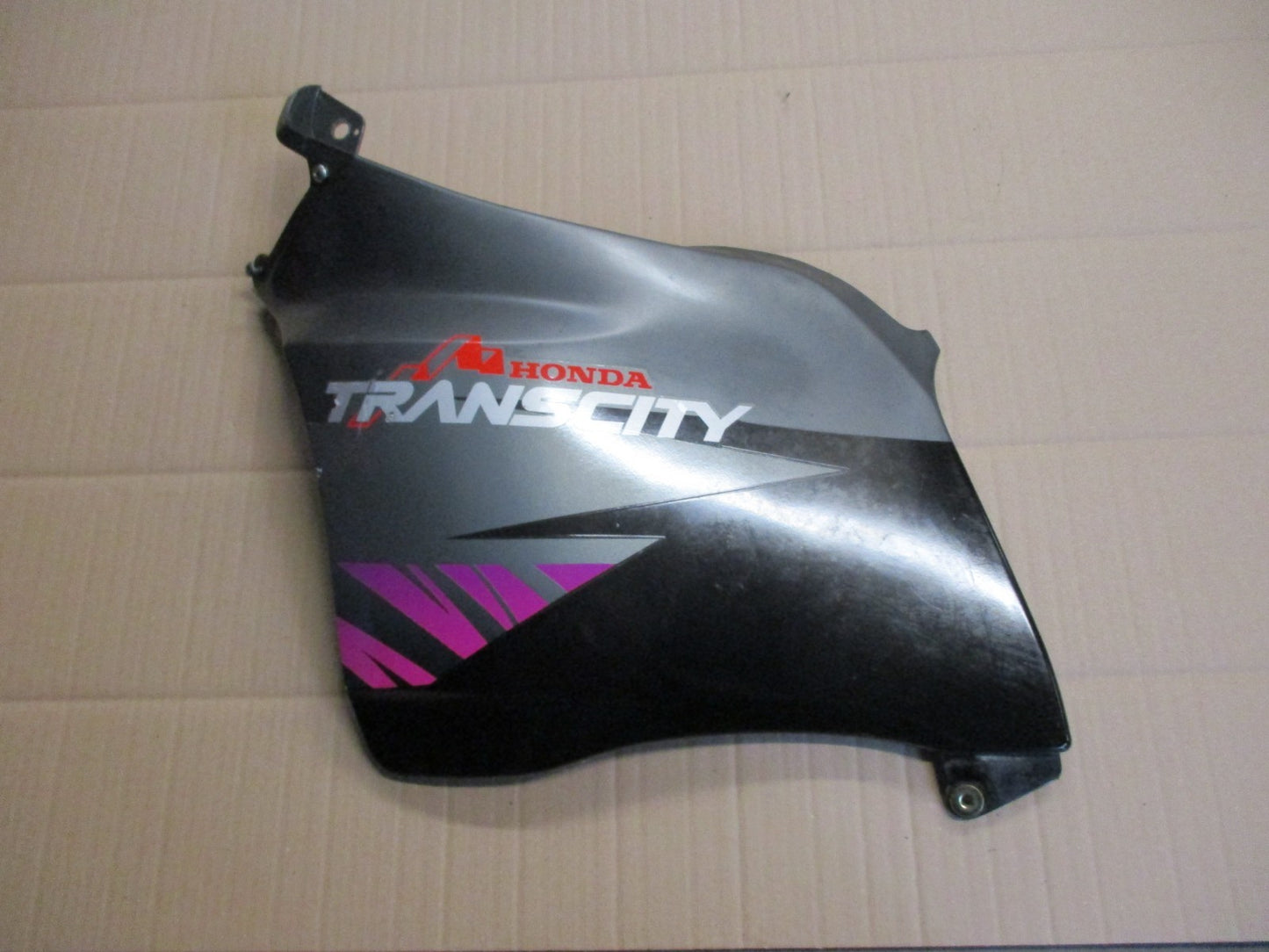 Flanc de carénage gauche pour Honda 125 NX Transcity - JD12