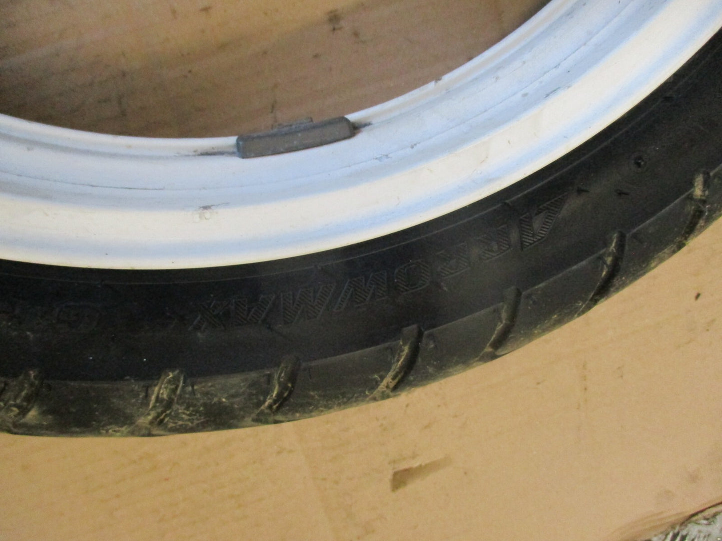 Roue arrière avec pneu DUNLOP Arrowmax ayant peu roulé pour Yamaha 125 TZR - 2RL