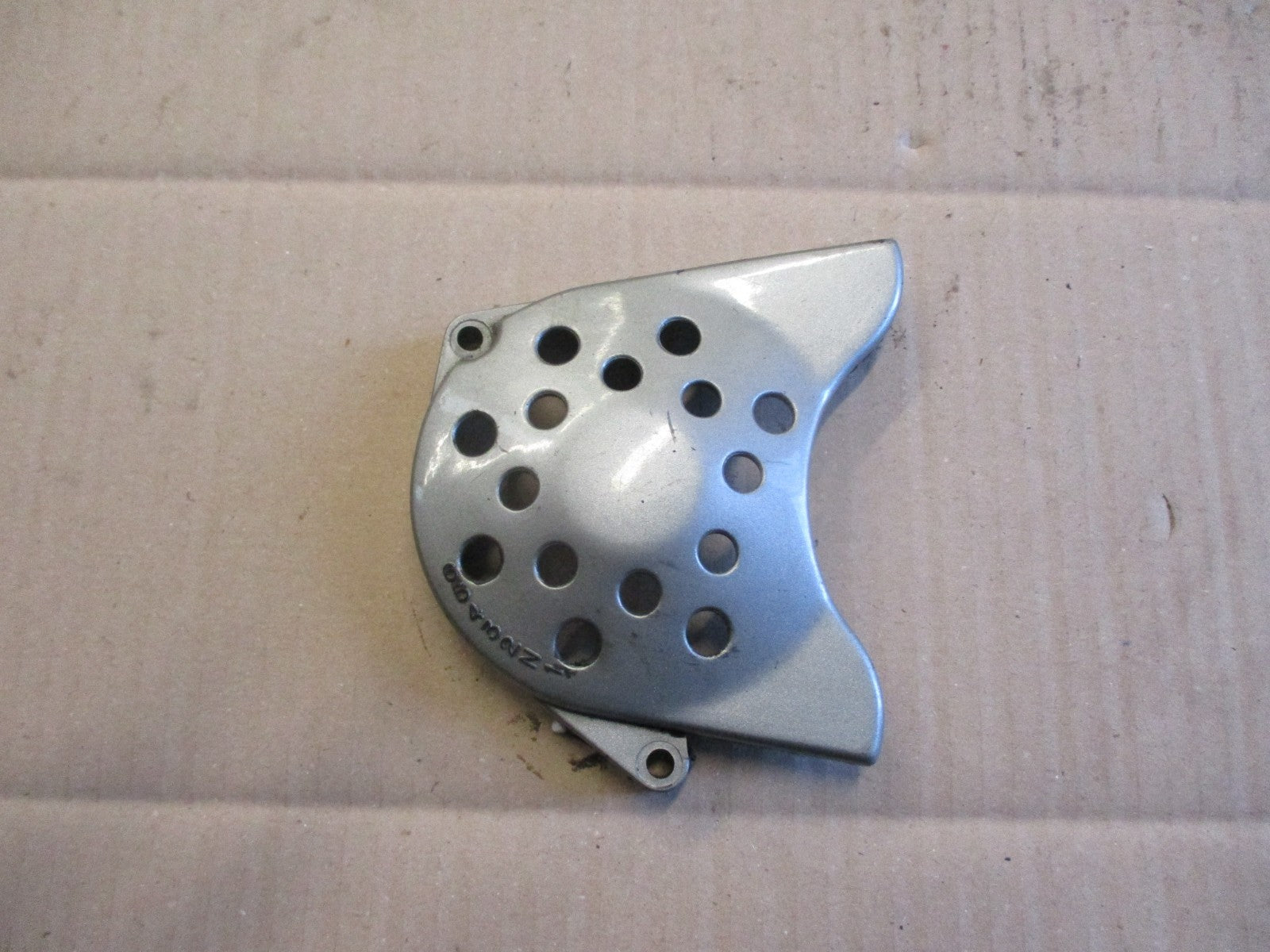 Cache pignon pour Suzuki 125 TSR - SF15A