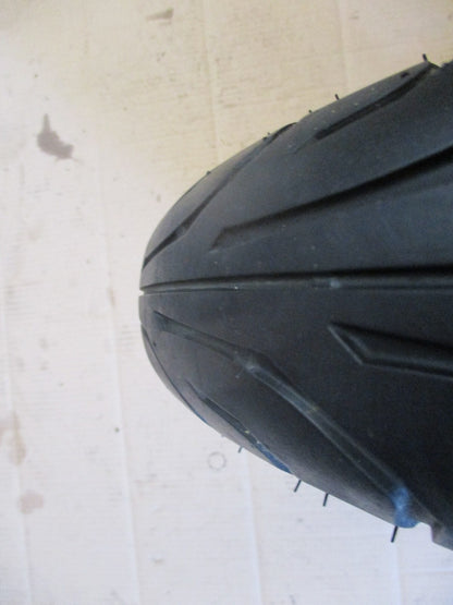 Roue arrière avec pneu DUNLOP Arrowmax ayant peu roulé pour Yamaha 125 TZR - 2RL