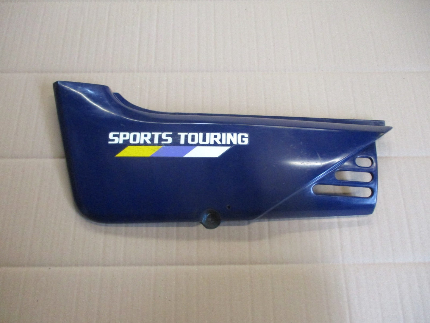 Cache latéral gauche pour Honda 125 NX Transcity - JD12
