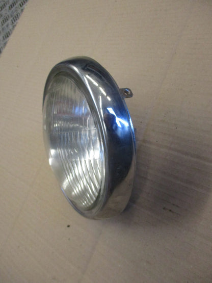 Optique de phare STANLEY 0001-1293 + cerclage pour Honda 125 CM - JC05