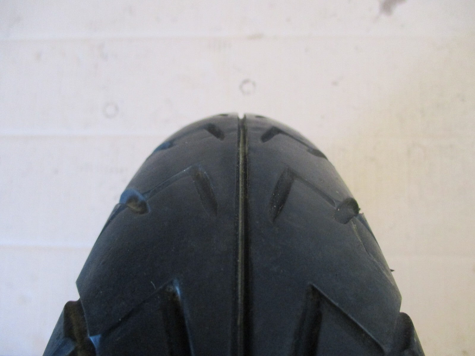 Roue avant avec pneu DUNLOP Arrowmax ayant peu roulé pour Yamaha 125 TZR - 2RL