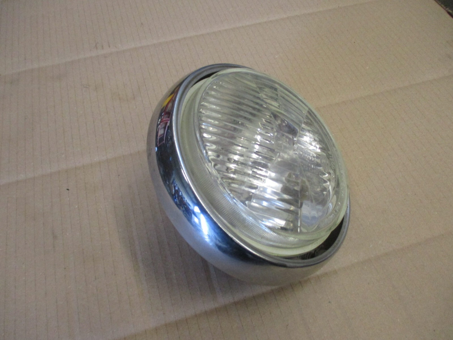 Cuvelage et optique de phare pour Honda 125 Rebel - JC24A - JC26A