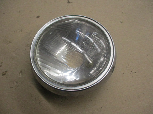 Optique de phare STANLEY 0001-1293 + cerclage pour Honda 125 CM - JC05